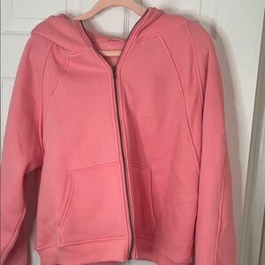 Soft Pink Lily Pink Sweatshirt with hood, front hand pocket, and thumb holes.